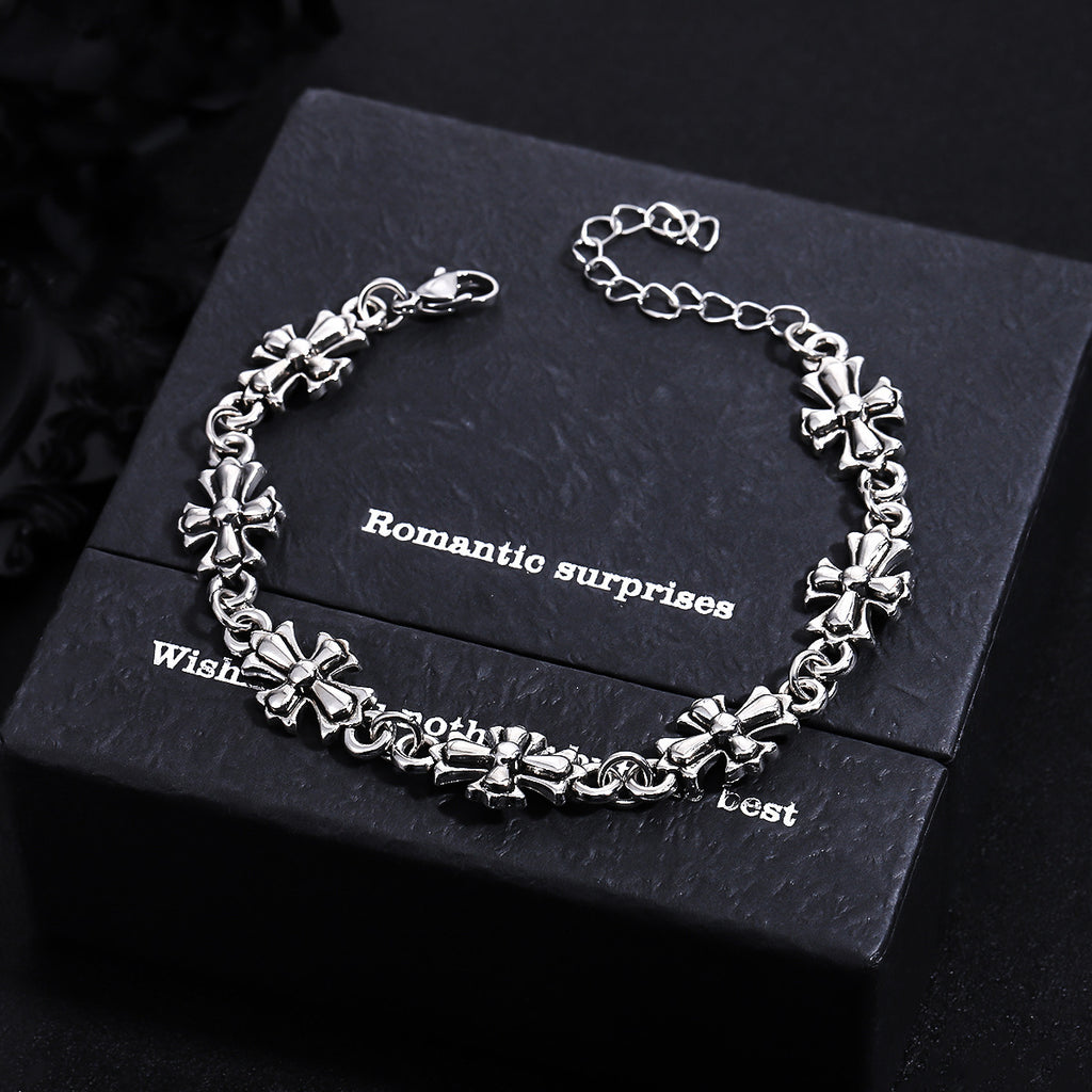 Repeating Starburst Cross Charm Bracelet and Necklace