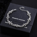 Repeating Starburst Cross Charm Bracelet and Necklace