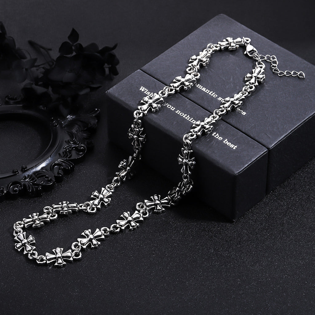 Repeating Starburst Cross Charm Bracelet and Necklace