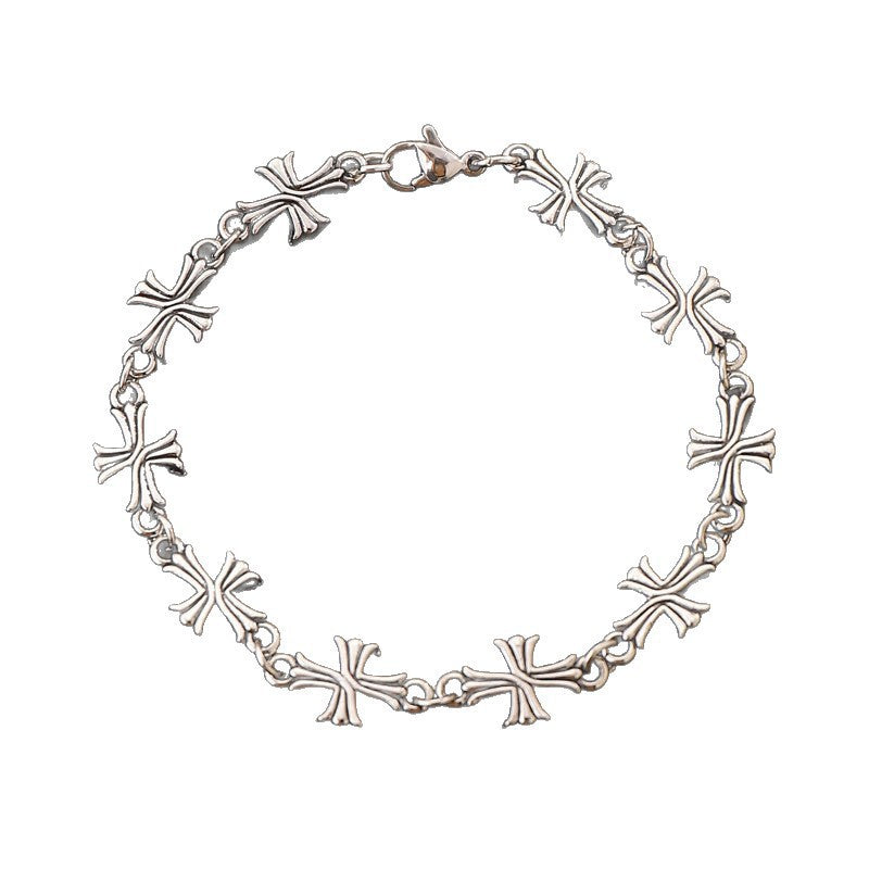 Repeating Intricate Cross Charm Bracelet
