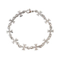 Repeating Intricate Cross Charm Bracelet